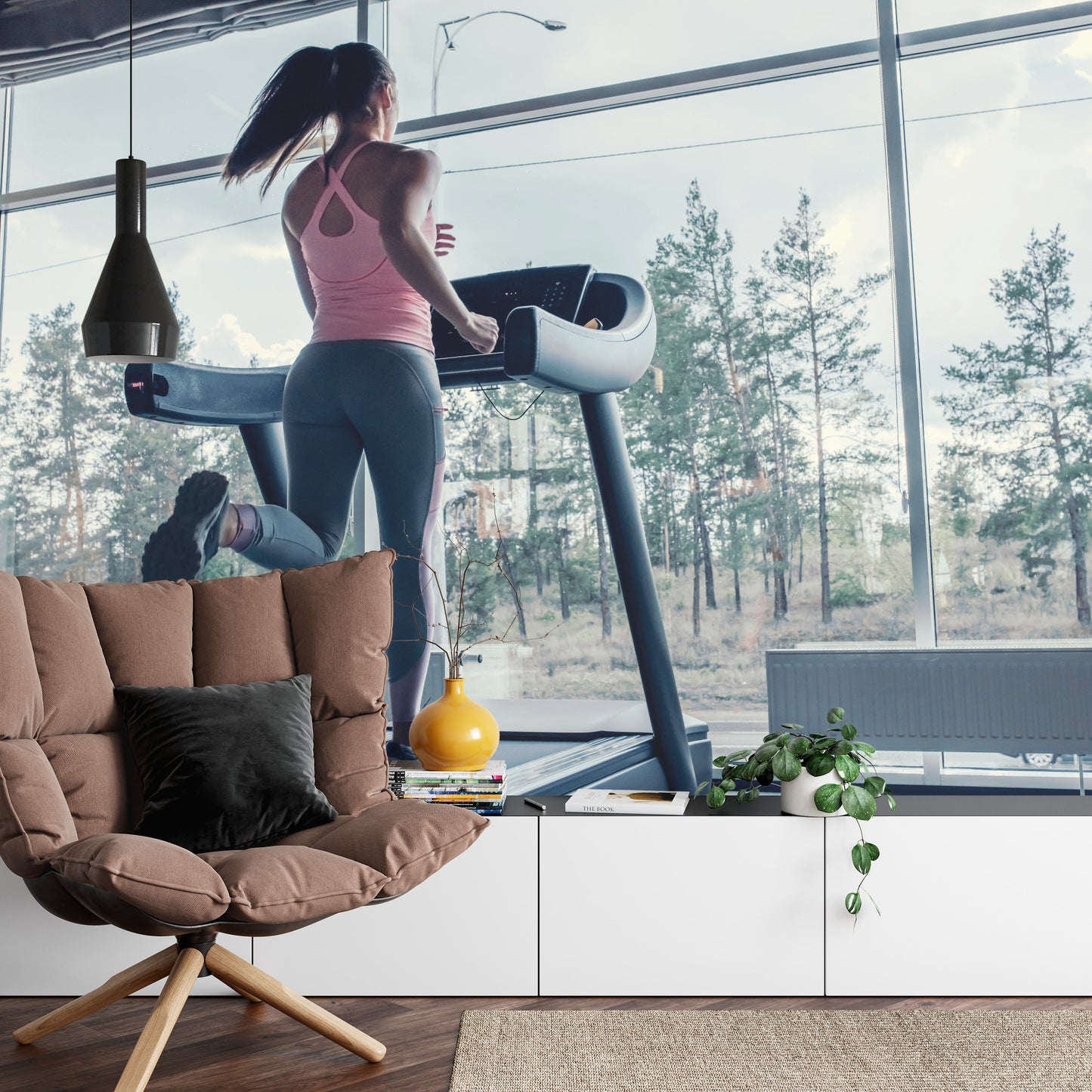 Photomural Woman On A Treadmill With The Landscape Outside The Window